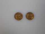 two gold coins, one of which is a sovereign and the other of which is a sovereign