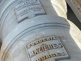 a large metal pipe that is sitting on the ground