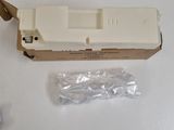 a white box with a white handle and a plastic container