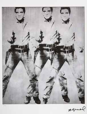 an old black and white photo of three men in cowboy outfits