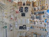 a room with many items on the shelves in it