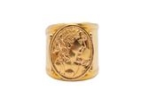 a gold ring with a roman coin in the center