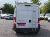 a white van that is parked in a parking lot