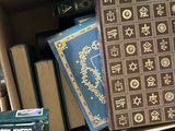 many books on a shelf in a book store