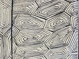 an image of a black and white rug with a pattern on it