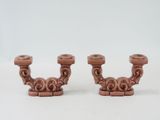 pair of antique cast iron candlesticks with scroll design