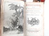 an old book with a picture of a man on a horse