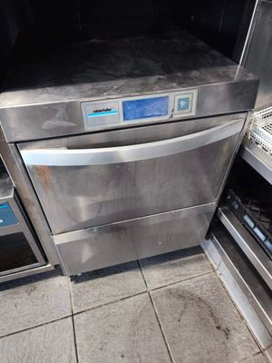 a stainless steel oven that is open on the floor