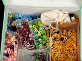 a box full of assorted candy and candies
