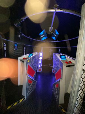 a view of the inside of a train with lights on
