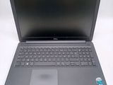 a laptop computer that is sitting on a table