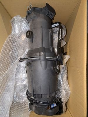 a box with a black object inside of it