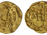une pièce d'or portant l'image d'un homme et d'une femme