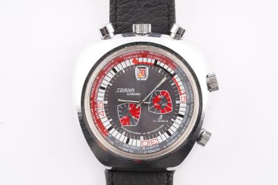 an image of a close up of a wrist watch on a white surface