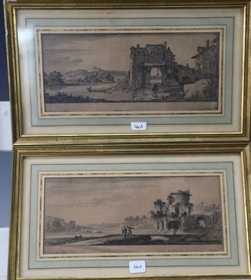 deux reproductions encadrées représentant un paysage avec un château en arrière-plan