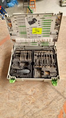 a tool box that has tools in it on the floor