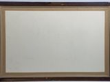 a close up of a mirror on a wall with a wooden frame