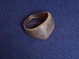a ring that is sitting on a blue carpet