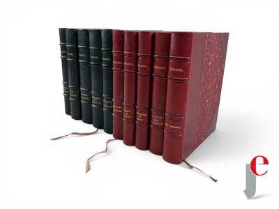 three books are stacked on top of each other on a white surface