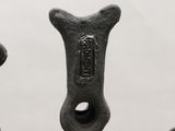 a close up of a metal object with a hole in it