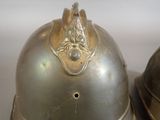 two helmets that are sitting on top of each other