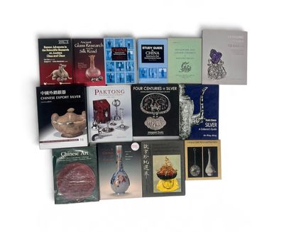 a lot of books that are sitting on a table