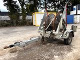 an image of a trailer with a hose attached to it