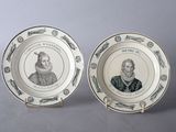 two plates with a picture of a man and a woman on them