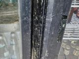 a picture of a dirty glass door with a lot of dirt on it
