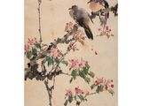 two birds sitting on a branch of a tree with flowers