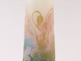 a glass vase with a floral design on it