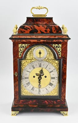 a clock that is sitting on top of a table