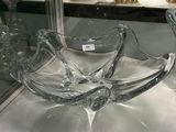 a glass bowl that is sitting on a table