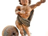 a statue of a child with a ball on a white background