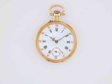 an old gold pocket watch with roman numerals and roman numerals on the face