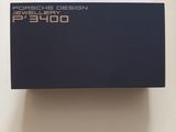a close up of a box on a table with a cell phone
