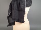 an image of a black scarf on a mannequin head