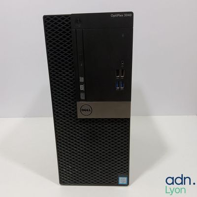 a close up of a dell desktop computer on a white surface