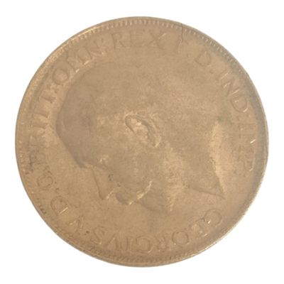une vieille pièce de monnaie sur laquelle figure l'image d'un homme