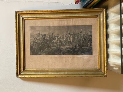une image d'un tableau accroché au mur