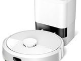 une image représentant un aspirateur robot surmonté d'une boîte