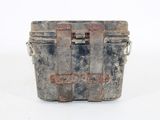 an old metal box with some rust on it