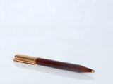 an image of a pen on a white surface