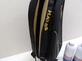 a black bag with a yellow and black logo on it