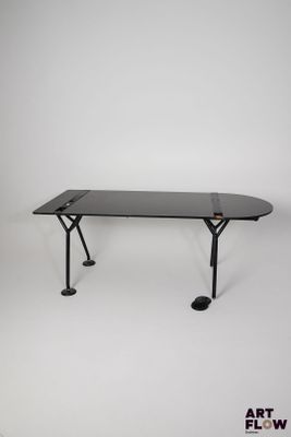 an image of a black table with a black top and black legs