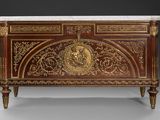 an antique chest with a marble top and gold decoration