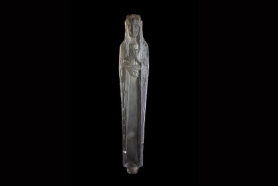 a statue of a woman holding a knife in her hand
