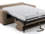 a sofa bed with a pull out bed attached to it