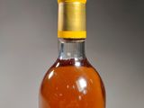 a bottle of wine that is sitting on a table