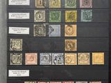 a picture of a collection of stamps in a display case